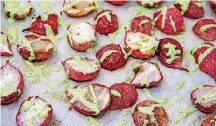  ?? [MELISSA D’ARABIAN VIA AP] ?? Roasted radishes with green goddess dressing made from Greek yogurt, lemon juice, dill and parsley.