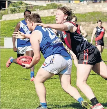  ?? PHOTO: Paul Martin ?? GOTCHYA: Bonnie Doon’s Archie Smith tackles his Bright opponent in a tough last home and away match for the season.