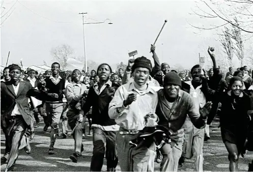  ?? Picture: © Peter Magubane ?? An image from the June 16 1976 Soweto uprisings. ‘In order to survive you have to think fast,’ said Magubane of life as a frontline news photograph­er. ‘You can’t let anyone get between you and your camera.’