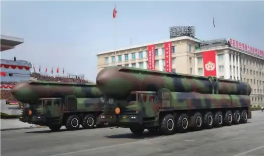  ??  ?? North Korea showing off its military arsenal last month
