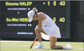  ?? Ben Curtis / Associated Press ?? Simona Halep reacts after losing a point to Su-Wei Hsieh during their women’s singles match at Wimbledon on Saturday.