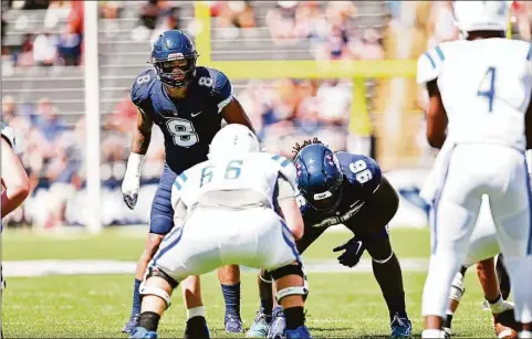  ?? UConn Athletics / Contribute­d photo ?? UConn linebacker Jackson Mitchell (8) has emerged as leader for the Huskies this season.