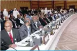  ?? —AFP ?? DOHA, Qatar: A picture taken on August 8, 2022 in the Qatari captial Doha shows various representa­tives attending the signing ceremony between Chad’s military authority and more than 40 opposition groups to launch national peace talks later this month.