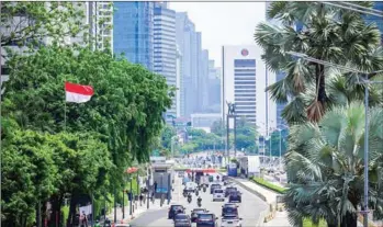  ?? AFP ?? Indonesia had just celebrated the milestone of moving into the group of upper-middle income countries from its previous lower-middle income status, as its gross national income (GNI) per capita reached $4,050 in 2019, slightly above the $4,046 threshold for the category.