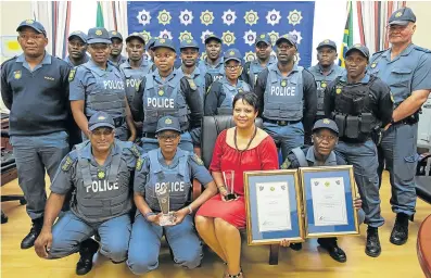  ?? Picture: ALAN EASON ?? CRIME BUSTERS: Members of the Mdantsane cluster won the Team of the Year award at the SAPS National Excellence Awards in Mpumalanga last week. They reduced crime by 50%, tracked down a massive R6.5m drug stash and nabbed a number of armed robbers.