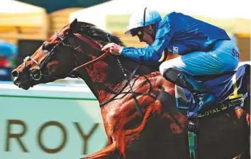  ?? Rex Features ?? Barney Roy, ridden by James Doyle, winning the St James’s Palace Stakes in record-breaking time at Royal Ascot in June. The three-year-old is set to become a stallion next season.