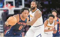  ?? MARY ALTAFFER/AP ?? Knicks forward OG Anunoby drives against Nuggets center Deandre Jordan, second from left, in the second half on Thursday at Madison Square Garden in New York.