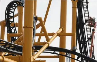  ?? Darrell Sapp/ Post- Gazette ?? The Steel Curtain roller coaster during its constructi­on at Kennywood park.