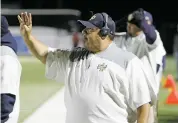  ??  ?? Andrew Martinez, head coach of the Santa Fe High School football team, says the size disparity between his Demons and the Escalante Lobos hasn’t been a big talking point.