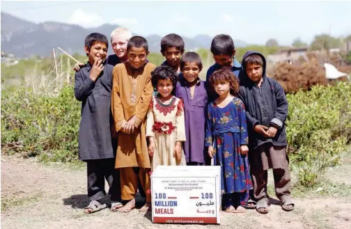  ?? WAM ?? Food distributi­on begins in Jordan, Pakistan (above) and Egypt as part of the ‘100 Million Meals’ campaign that aims to support disadvanta­ged communitie­s across 20 countries.