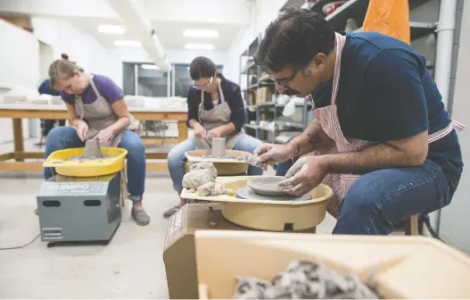  ?? BRANDON HARDER ?? Kathleen Wilson, left, Kristin Schmidt and Mohit Sapru put their creativity to work during an Intro to Clay class at Silt Studio on Albert Street.