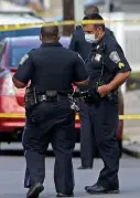  ?? STUART CAHILL / HERALD STAFF FILE ?? ON THE FRONT LINE: Boston Police protect neighborho­ods from gangs and heavily armed criminals.