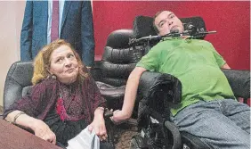  ?? GRAHAM HUGHES TORSTAR FILE PHOTO ?? Nicole Gladu, left, and Jean Truchon attend a news conference in Montreal in 2019, where they gave their reaction to a Quebec judge overturnin­g parts of provincial and federal laws on medically assisted dying.