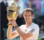  ??  ?? TRIPLE CROWN: Andy Murray with his Wimbledon trophy after clinching the title for the second time this summer