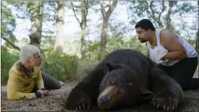  ?? UNIVERSAL PICTURES VIA AP ?? This image released by Universal Pictures shows Aaron Holliday, left, and O’shea Jackson, Jr. in a scene from “Cocaine Bear.”