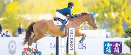  ?? CONTRIBUTE­D ?? Jamaican rider Rachael Chandley in competitio­n at the Federation Equestre Internatio­nale CSIO for Juniors and Young Riders in Tianjin, China, where she placed second.