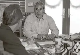  ?? Jerry Lara / San Antonio Express-News ?? Nirenberg, meeting with his transition team at his house, said he wants to “present an image that belies the brand we have.” The Alamo City has a reputation as being “Fat” Antonio and is ranked among the nation’s 20 fattest cities.