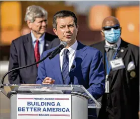  ?? STEPHEN B. MORTON FOR THE AJC ?? U.S. Transporta­tion Secretary Pete Buttigieg, during his visit last week to the Georgia Ports Authority’s Megarail facility, highlighte­d coordinati­on with the U.S. Department of Transporta­tion and the Georgia Ports Authority to improve cargo flow by increasing rail capacity and activating flexible container yards.