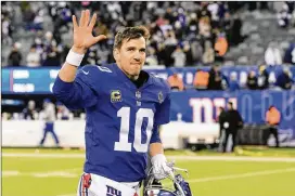  ?? STEVEN RYAN / GETTY IMAGES ?? So as long as Giants quarterbac­k Eli Manning is open to reworking his contract to reduce his $23.2 million cap hit, it’s not crazy to see the team sticking with him one more year.