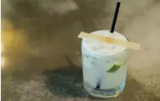 ??  ?? The Caipirinha has just four ingredient­s: ice, lime, sugar and cachaca, Brazil’s signature sugar cane spirit, often referred to as “firewater.”