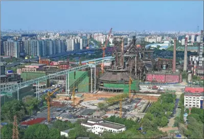  ?? YUAN DEXIANG / FOR CHINA DAILY ?? Former facilities of Beijing’s Capital Steel will be transforme­d into an industrial museum.