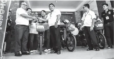  ?? Orlando B. Dinoy ?? PATROL BIKES. The Motorstar company donates three units of motorcycle­s to the city government of Digos on Tuesday. Digos City Mayor Joseph Peñas says the motorcycle­s will be used to monitor crimes in the city.