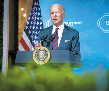  ?? AL DRAGO/THE NEW YORK TIMES ?? President Joe Biden addresses a virtual summit on plans to reduce global warming Thursday.