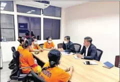  ?? MFAIC ?? Cambodian embassy officials meet with Cambodian migrant workers who were arrested in Thailand in April.