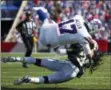  ?? RICH BARNES — THE ASSOCIATED PRESS ?? Buffalo Bills quarterbac­k Josh Allen, top, is tacked by Los Angeles Chargers’ Jahleel Addae during the second half of an NFL football game, Sunday in Orchard Park, N.Y.