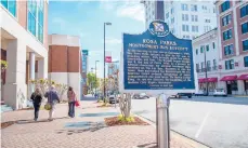  ?? DREAMSTIME/TNS ?? A sign marks Rosa Parks’ bus stop in downtown Montgomery, Alabama.