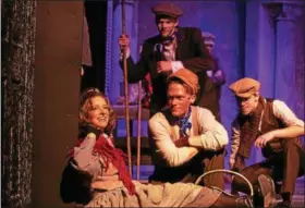  ?? KATHY SANDHAM ?? Lindsey Leonard, Andy Cervelli, center front, Thomas Horne and Stephen Sandham, background, perform in the Rabbit Run Theater production of “My Fair Lady.”