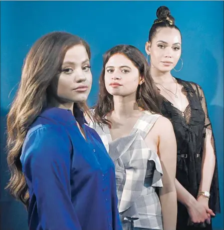  ?? Jennifer S. Altman For The Times ?? THE NEW “Charmed” is led by, from left, Sarah Jeffery, Melonie Diaz and Madeleine Mantock. The 1998-2006 version has vocal fans.