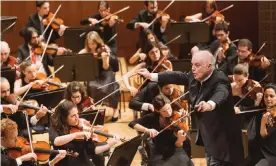  ??  ?? ‘Insipring’: Daniel Barenboim conducts the West-Eastern Divan Orchestra, made up of musicians from across the Middle East. Photograph: Stefan Deuber