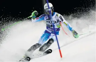  ?? ALEXIS BOICHARD/AGENCE ZOOM/GETTY IMAGES ?? Ted Ligety of the United States won the gold medal in the giant slalom competitio­n at the 2014 Winter Games at Sochi, Russia.