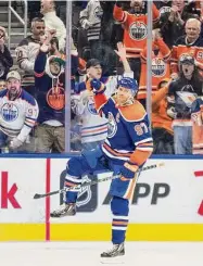  ?? Jason Franson/Associated Press ?? The Edmonton Oilers’ Connor McDavid celebrates a goal against the Tampa Bay Lightning during the third period on Jan. 19 in Edmonton, Alberta.