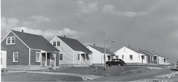  ??  ?? A wartime housing developmen­t in Ajax. These homes are similar in design to the “ideal workingman’s home” proposed by the Workers’ Education Associatio­n in 1944.