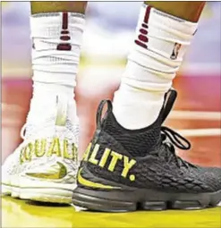  ?? USA TODAY ?? LeBron James targets President Trump with choice of footwear.