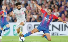  ?? — Reuters ?? Liverpool’s Mohamed Salah in action with Crystal Palace’s James Tomkins.