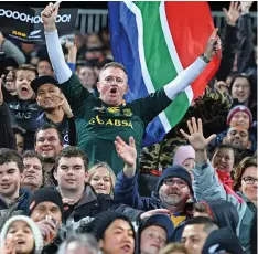  ?? ANDREW CORNAGA / www.Photosport.nz ?? SPRINGBOK fans during a Championsh­ip test match. They are likely to watch the Lions Tour in the comfort of their homes |