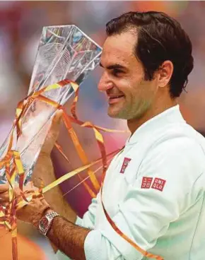  ?? AFP PIC ?? Roger Federer celebrates after winning the Miami Open on Sunday.