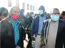  ?? ?? Minister of Higher Education, Science and Innovation Blade Nzimande engaging with Edendale mega superspar owners after their shops were vandalised during the July unrest.
