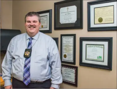  ?? WILLIAM HARVEY/TRILAKES EDITION ?? Saline County Coroner Kevin Cleghorn is the new president of the Arkansas Coroners’ Associatio­n, which strives to educate coroners, as well as members of the public and county officials about the duties of a coroner. Elected county coroner in 2015,...