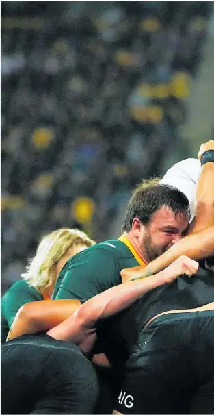  ??  ?? Springboks lock Franco Mostert is upended in a maul as the All Blacks drive