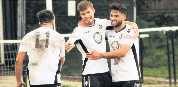  ?? James Smith ?? George Lomax (right) netted against Droylsden but Widnes FC went out of the FA Trophy last Saturday afternoon losing the tie 2-1.