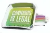  ??  ?? An ad at checkpoint­s reads: “Cannabis is legal. Traveling with it is not.” ORGANA BRANDS