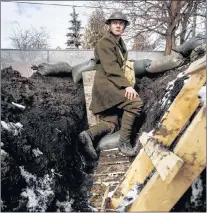  ?? CP PHOTO ?? High school student Dylan Ferris pictured in the trench he built in his backyard, in Edmonton Alta, on Thursday.
