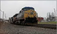  ?? FILE PHOTO BY TONY ADAMIS ?? A CSX freight train passes through Kingston, N.Y., in this photo from February 2016.