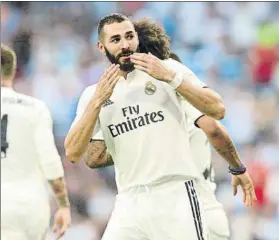  ?? FOTO: AP ?? Benzema celebra su tempranero gol ante el Milan