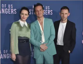  ?? PHOTO BY JORDAN STRAUSS/INVISION/AP ?? Claire Foy, from left, Andrew Scott and Jamie Bell arrive at a screening of “All of Us Strangers,” Saturday, Dec. 9, 2023, at Vidiots in Los Angeles.