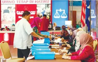  ??  ?? A special counter at the Umno headquarte­rs in Putra World Trade Centre to receive election documents from party members.